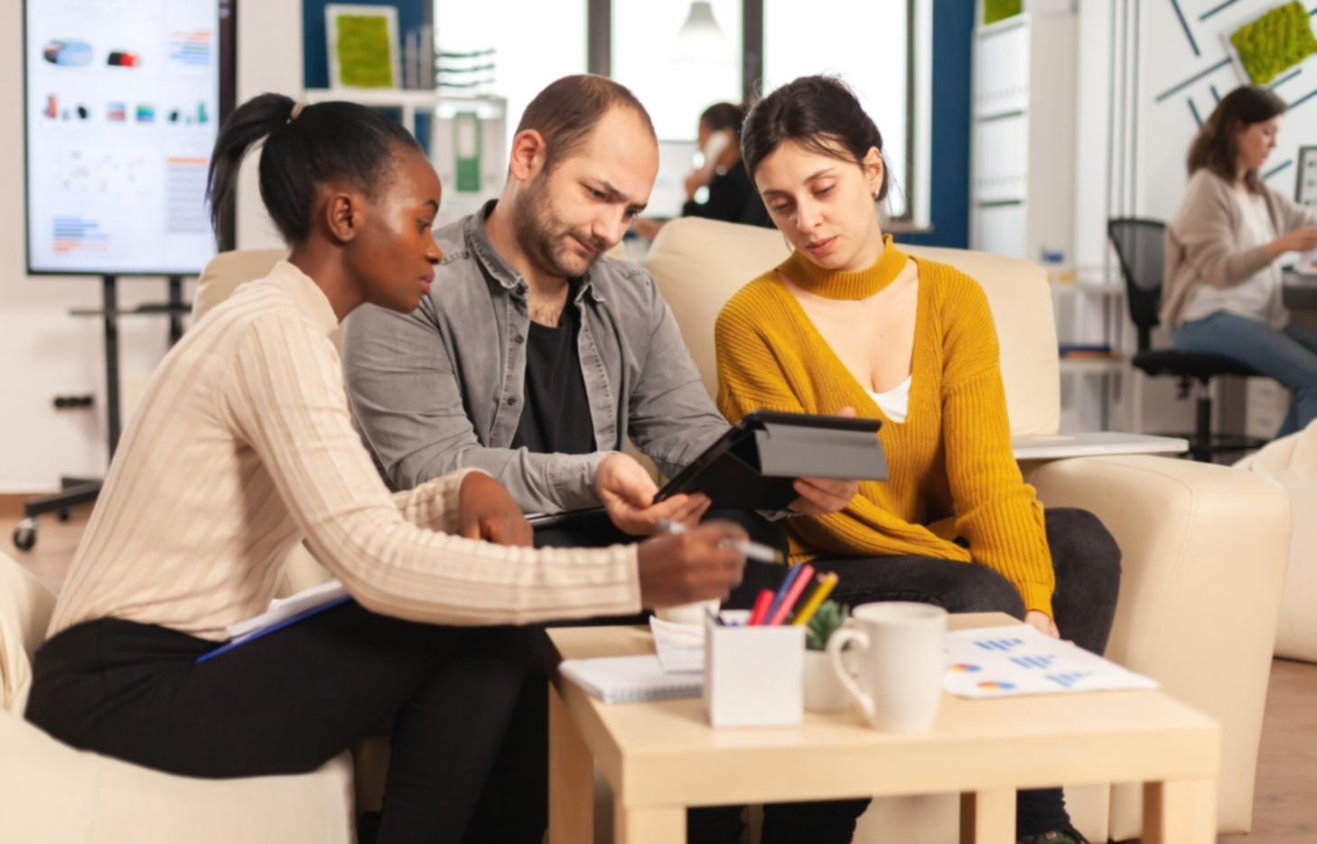 Person reviewing financial statements and making notes